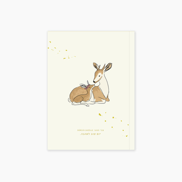 mini notebook with illustrated deer